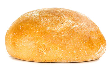 a loaf of round white bread on a white background side view