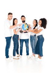 Fototapeta premium multicultural group of young people pointing with fingers at globe isolated on white