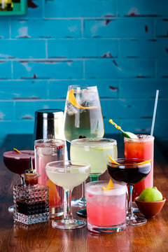set of Classic alcoholic cocktails on bar counter in pup or restaurant