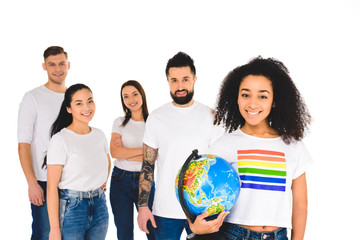 multiethnic group of young people standing behind african american woman with lgbt sign on t-shirt...