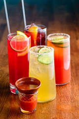set of Classic alcoholic cocktails on bar counter in pup or restaurant