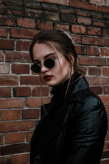 portrait of a young woman in sunglasses