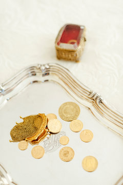 Wedding arras on a silver tray