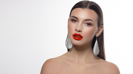 Sexual full lips. Natural gloss of lips and woman's skin. The mouth is closed. Increase in lips, cosmetology. Orange lips and long neck. Great summer mood with open eyes. fashion jewelry