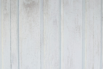 White soft wood surface as background.White vintage weathered wooden texture.