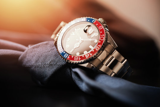 formal luxury men wristwatch with blue-red bezel