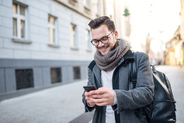 Texting in the city street.