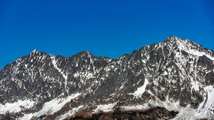 Beautiful view of mountain range from the peak of Achisho mountain, winter in Sochi, Russia.