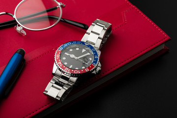 formal luxury men wristwatch with blue-red bezel