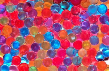 Many tiny colorful balls saturated in water. These make a good background or wallpaper for that added dash of color.