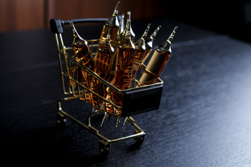Many brown ampoules set in cart