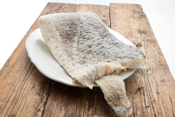 Slice of raw salted codfish