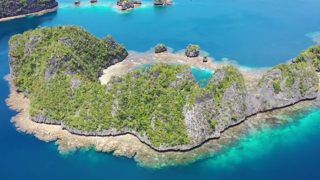 Aerial View of Rock Islands and Reef in Raja Ampat