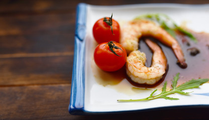 fresh boiled prawns with spices on Japanese traditional plates and chopsticks
