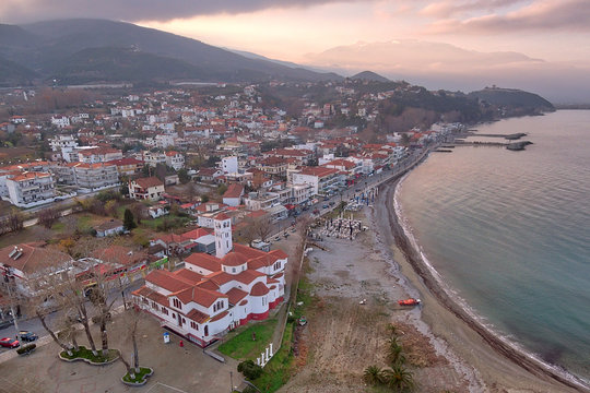 Aerial photo of the village of Platamonas with view of the coast and the castle, during sunset