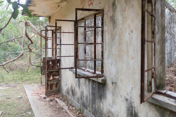 Fototapeta na wymiar Ruin of an abandoned house