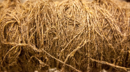 Light brown thread background. Not evenly spaced. Background and texture.