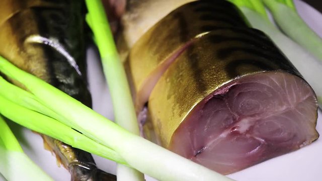 smoked, salted, boiled fish with green onions rotates. delicious food.