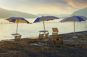 Beach vacation. Beautiful evening landscape at seaside.  Montenegro,  Adriatic Sea, Bay of Kotor, Tivat city