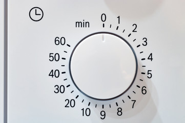 Microwave oven circular timer for one hour, analogue white.
