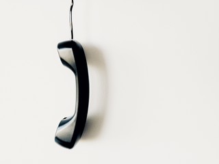 old telephone on white background