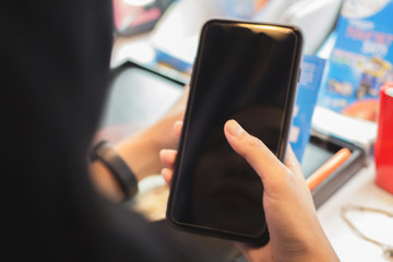 Registration employees are putting nano SIM cards in the store for customers to buy.