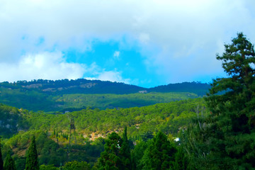landscape clouds descending on the mountains