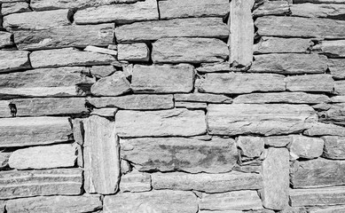 Wall of stones in gray color