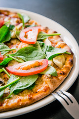 Neapolitan pizza made with fresh and organic ingredients