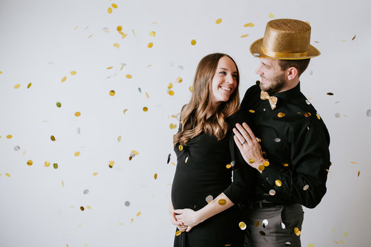 Pregnant Couple with Confetti