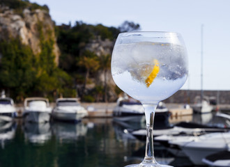 Gin and Tonic Cocktail overlooking marina