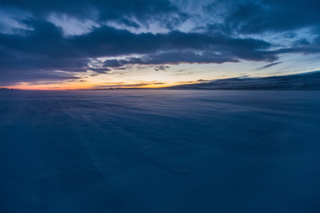 Fototapeta na wymiar Landscape of sunset in desert of Siberia.