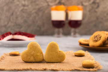 Two hearts are near. The concept of mutual love. Heart shaped cookies. Culinary decoration for Valentine's Day.