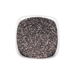 chia seeds in a white plate, top view, isolated