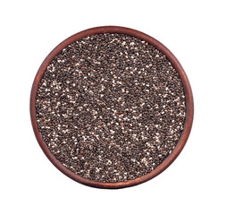 chia seeds in a cinnamon clay plate, top view, isolated