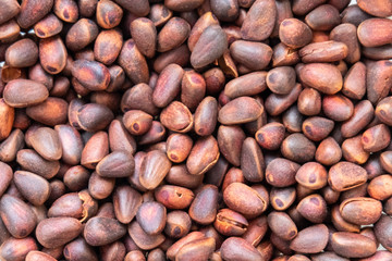 Background roasted pine nuts. Background roasted pine nuts. Healthy eating concept, vegetarianism....