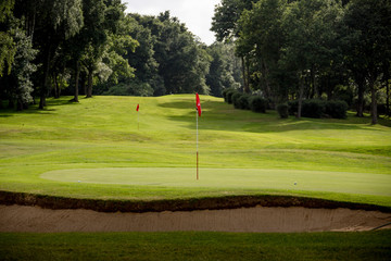 Obraz premium Scenic view of a Golf Green and Fairway