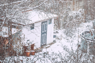 Little garden hovel covered with snow