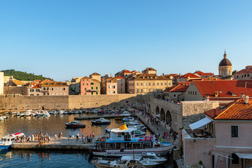 Fototapeta na wymiar View to the old harbor of Dubrovnik on sundown