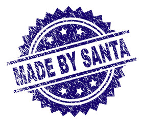 MADE BY SANTA stamp seal watermark with distress style. Blue vector rubber print of MADE BY SANTA caption with corroded texture.