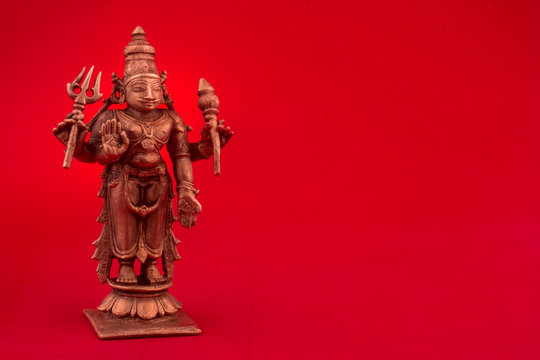 Shiva rudra god idol with red background