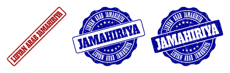 Fototapeta premium LIBYAN ARAB JAMAHIRIYA grunge stamp seals in red and blue colors. Vector LIBYAN ARAB JAMAHIRIYA marks with grunge surface. Graphic elements are rounded rectangles, rosettes, circles and text labels.