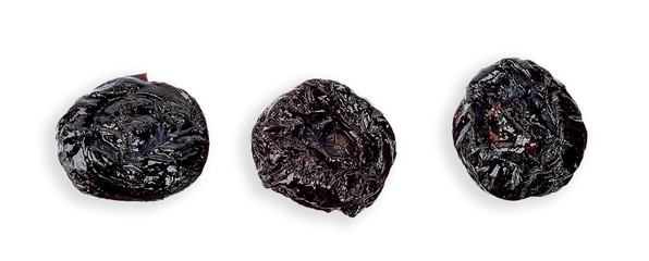 Dried prune isolated on white top view