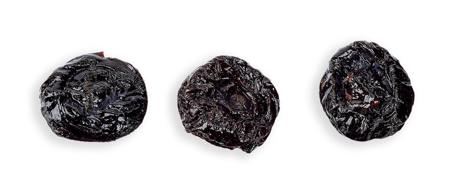 Dried prune isolated on white top view