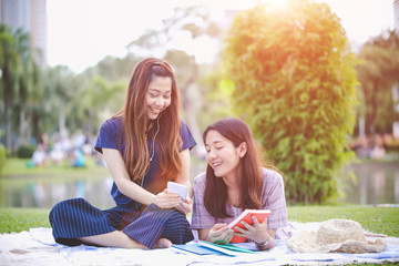 Naklejka premium Education concept - Group of women are happy with the book, Learning on the Campus or university.