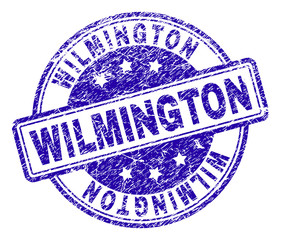 WILMINGTON stamp seal imprint with grunge texture. Designed with rounded rectangles and circles. Blue vector rubber print of WILMINGTON tag with grunge texture.