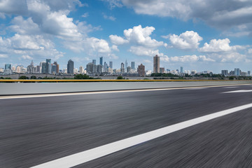 Panoramic skyline and modern business office buildings with empty road,empty concrete square floor