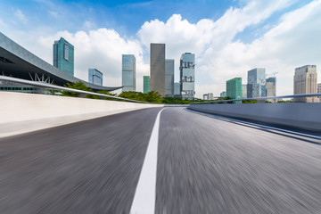 Panoramic skyline and modern business office buildings with empty road,empty concrete square floor