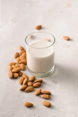Almond milk in glass. Organic healthy snack vegan vegetarian