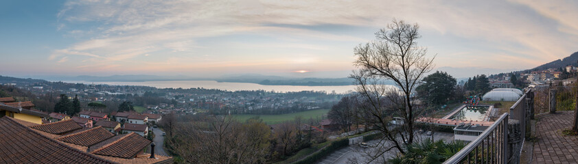 Italian lake at sunset. Aerial and panoramic view of Varese lake
